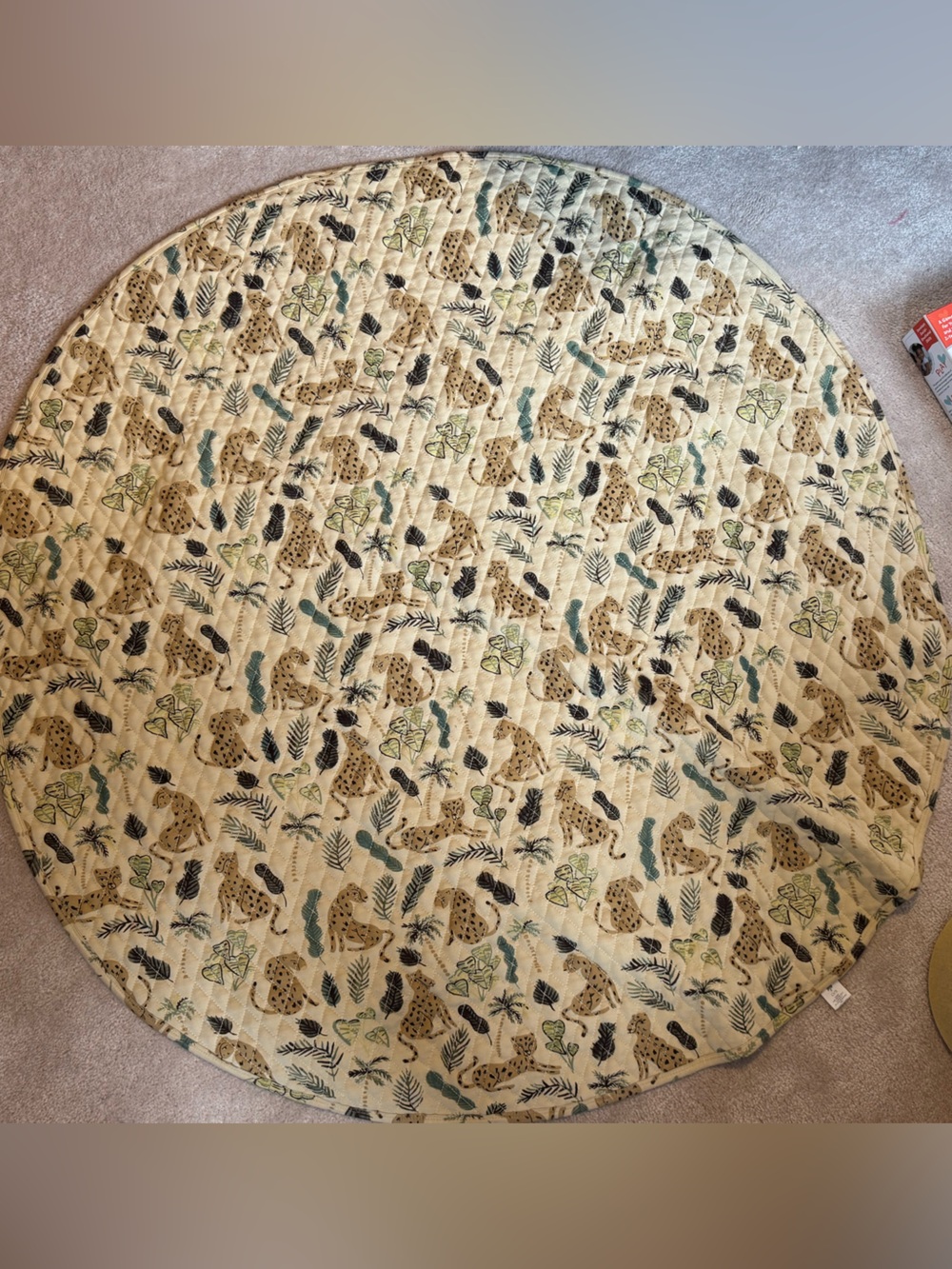 kate quinn Round Quilted Mat in Cream with Green and Brown Leaf & Leopard Print
